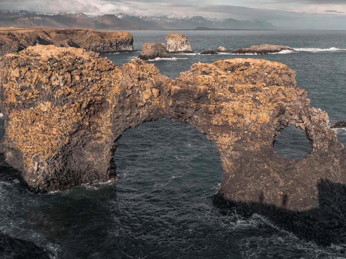 The Gatklettur basalt sea arch at Arnarstapi on the Snaefellsnes coast